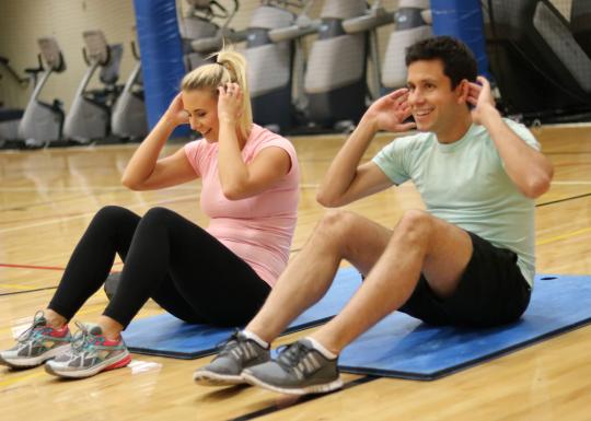 couple-situps-at-ymca-group-exercise-class.jpg