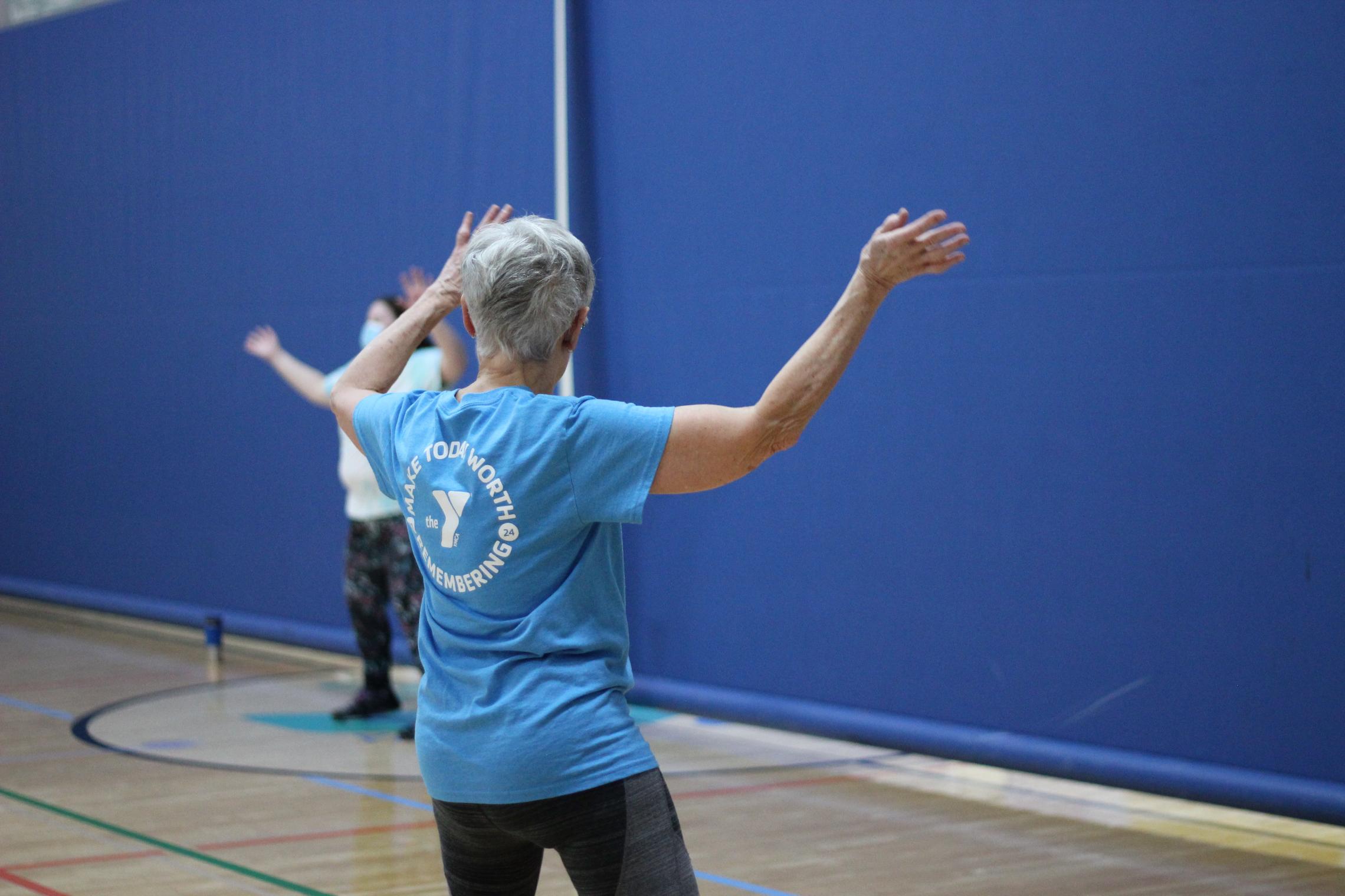 Group exercise instructor leads class at the YMCA
