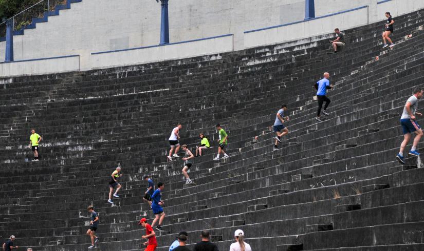 Unleashed participants run the steps at the Stadium High School football field