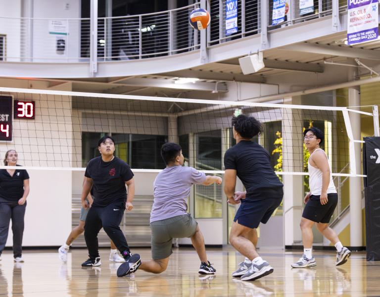 Action shot of a receiving bump during volleyball at the YMCA