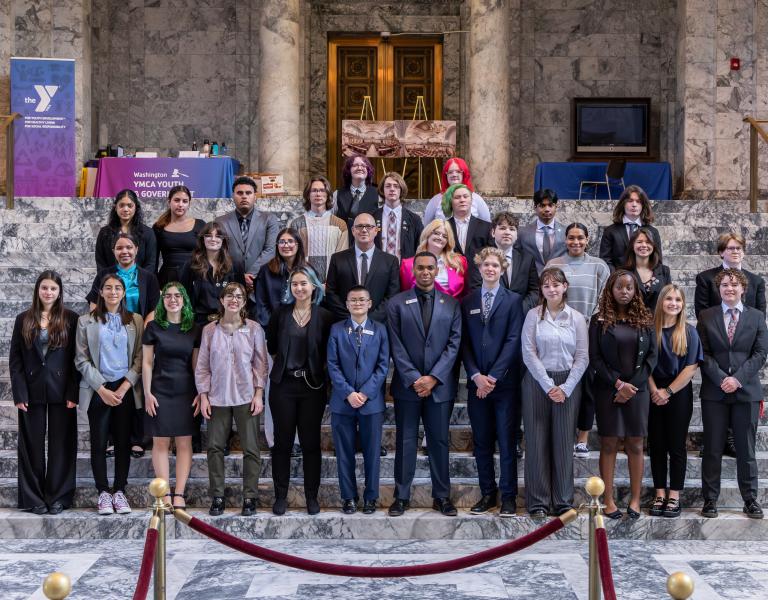 Photo of the Tacoma/Korum/FP Delegation of Youth and Government posing on the marble steps of the Washington State Capitol.
