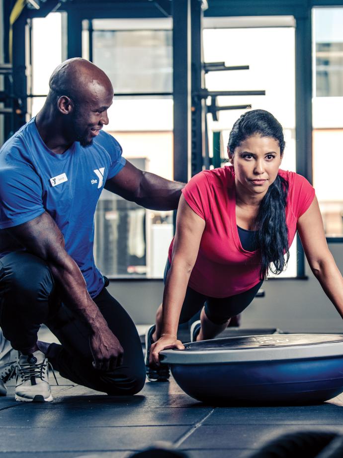 Training With A Bosu Ball At a YMCA Weight Training Class