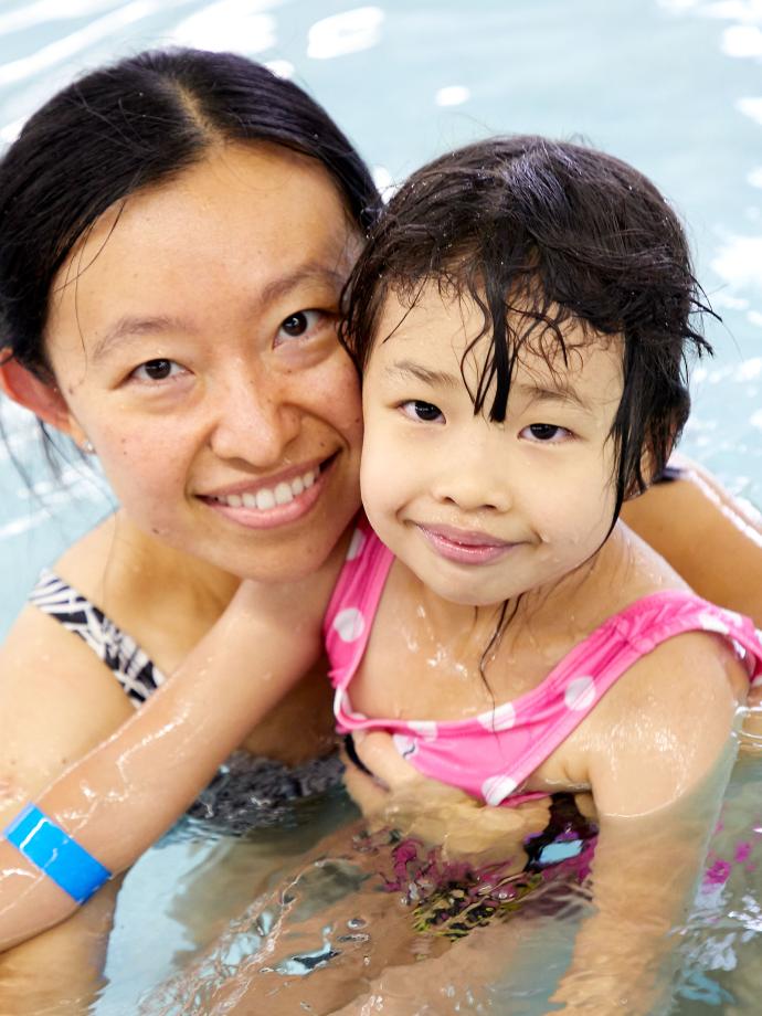 Mother and Daughter Smiling at YMCA Parent and Child Swim Lessons