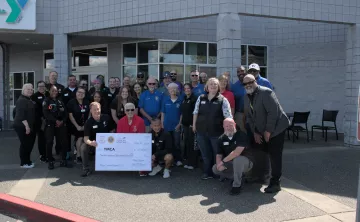 Cops vs Teachers Check Presentation at Lakewood Family Y